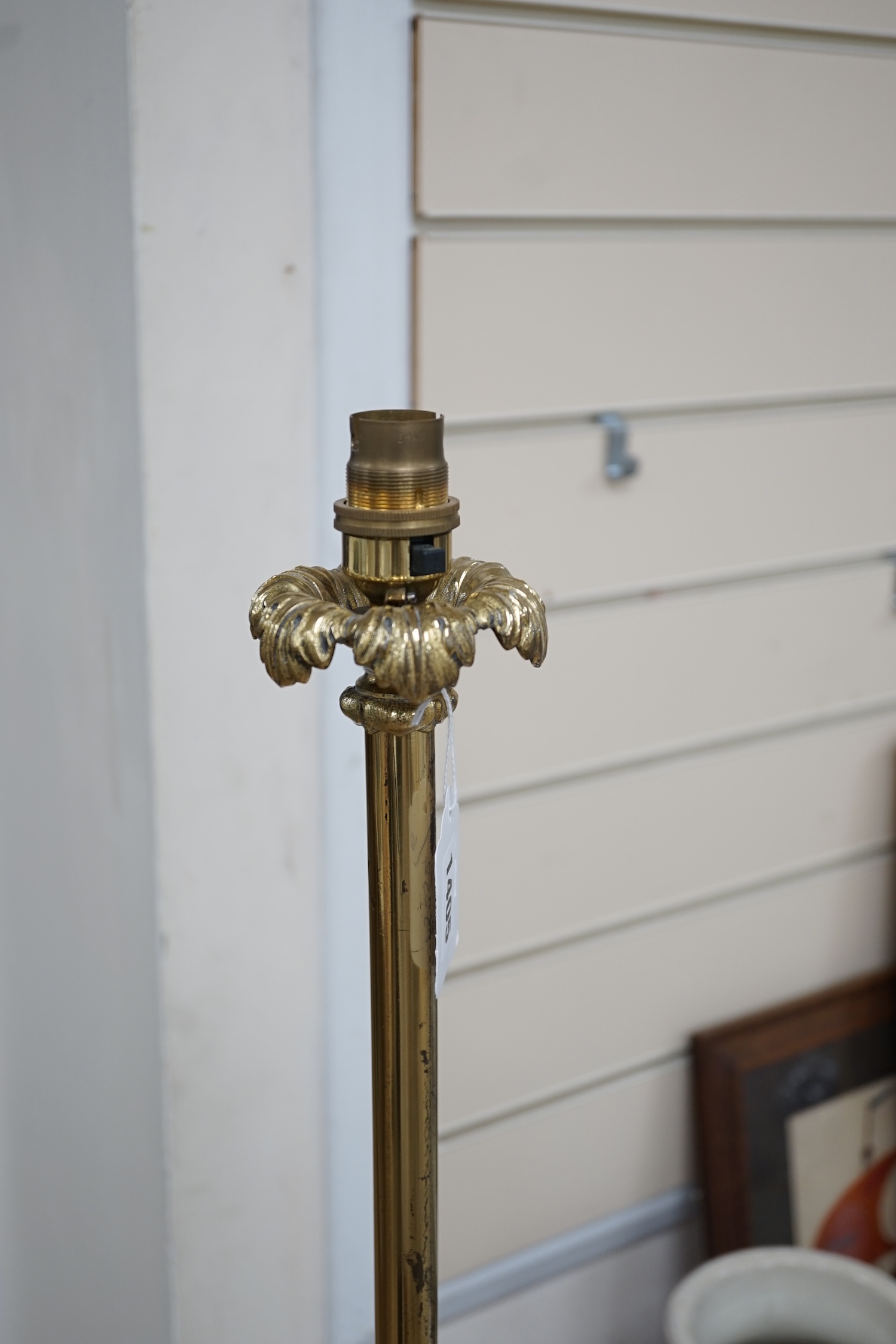 A modern brass standard lamp on tripod feet, 150cm. Condition - fair to good. Not tested as working